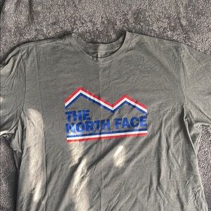 The North Face Gray Tee with Blue and Red Logo